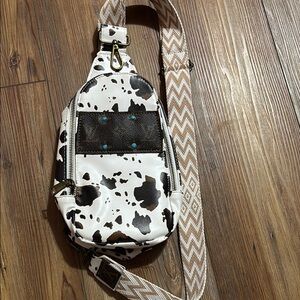 Cow Print Sling Bag with Brown Accents